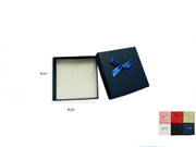 CONFEZIONE REGALO LANGES CON DOPPIO BORDO DORATO 9*9 CM